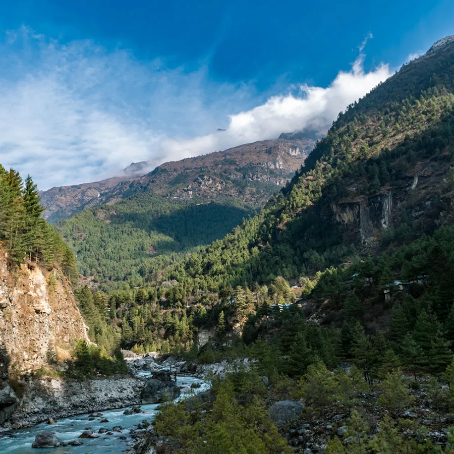 Green mountain valley with a winding river near Jim Corbett