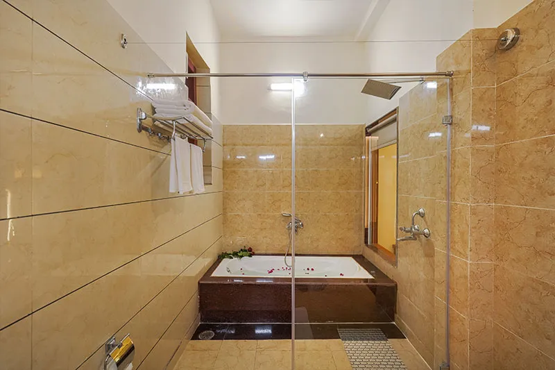Executive room soaking bathtub with rain shower