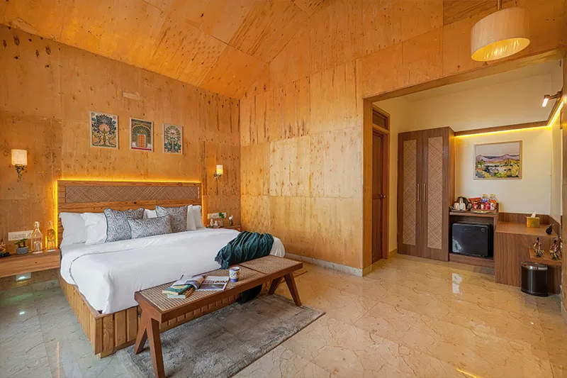 Premium room with balcony bed and headboard lighting